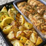 Close-up view of healthy lemon garlic chicken meal prep bowls with vibrant vegetables.