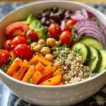 Close-up view of a colorful Veggie and Quinoa Power Bowl with fresh vegetables.
