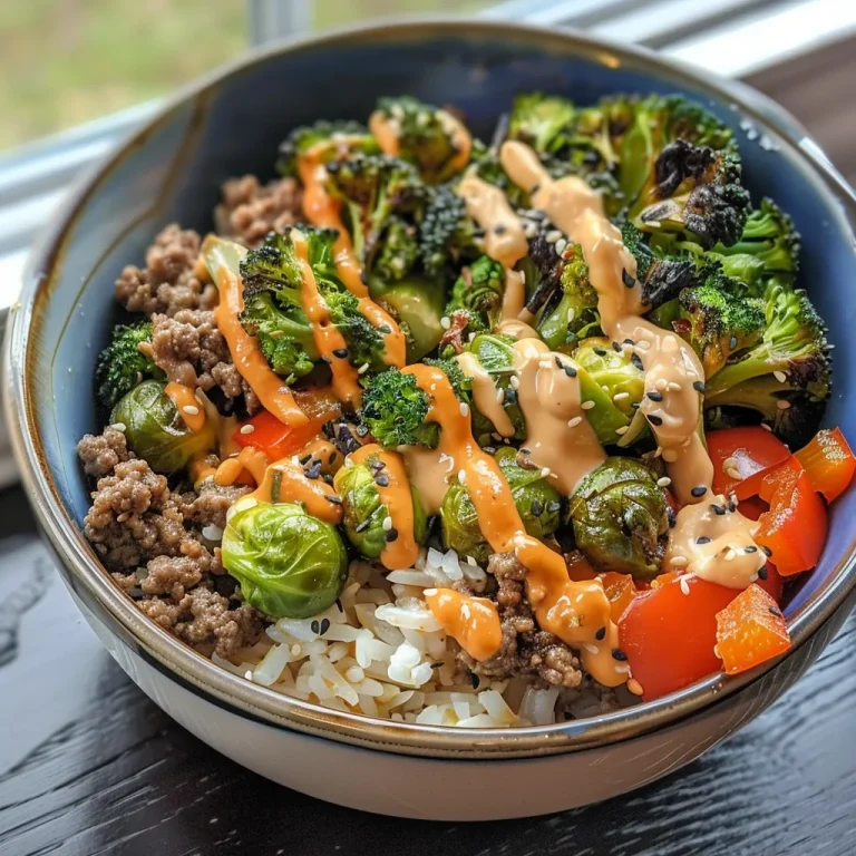 Beef Veggie Bowls with Comeback Sauce A Flavorful Weeknight Wonder Close-up view of a beef and veggie bowl topped with a creamy sauce.