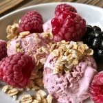Close-up view of vibrant Berry Yogurt Bites with strawberries and blackberries.
