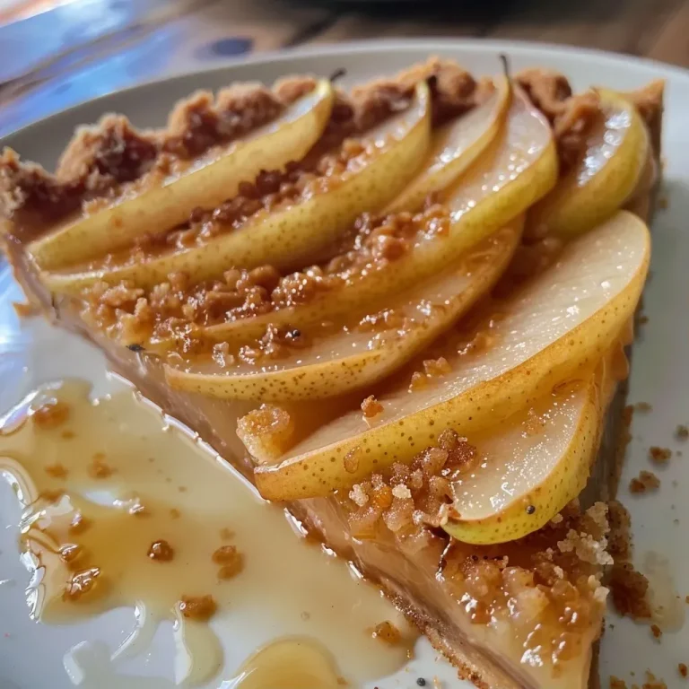 ['Close-up side view of a gingery pear tart with a golden crust and sliced pears on top.', 'Juicy vegan and gluten-free pear tart featuring a flaky crust and pear slices, captured with an iPhone.', 'Side view of a delicious gingery pear tart showcasing a textured crust and fresh pear filling.', 'Zoomed-in shot of a vegan gingery pear tart, highlighting the juicy pear slices and flaky pastry.']