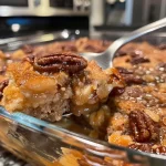 ['Close-up of a slice of Easy Pecan Cobbler showing a golden crust and rich pecan topping.', 'Side view of a delicious Easy Pecan Cobbler highlighting the layers of pecans and a crispy surface.', 'Juicy Easy Pecan Cobbler served on a plate, featuring a generous amount of chopped and whole pecans.', 'A scrumptious slice of Easy Pecan Cobbler captured with a focus on its gooey texture and nutty topping.']